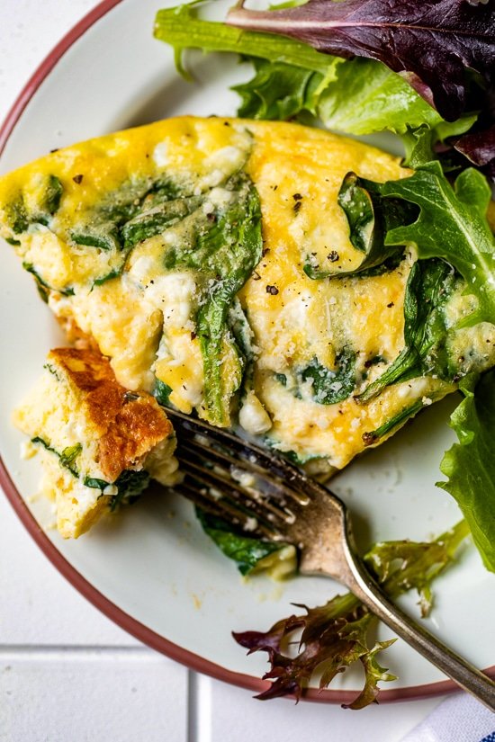 This protein-packed Cottage Cheese Egg Bake with spinach and chicken sausage is filling and delicious. Enjoy for breakfast, lunch, or dinner with a salad and some crusty bread.