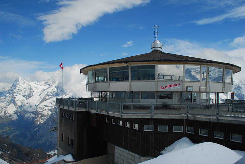 round restaurant with large windows for the views of the snow capped peaks