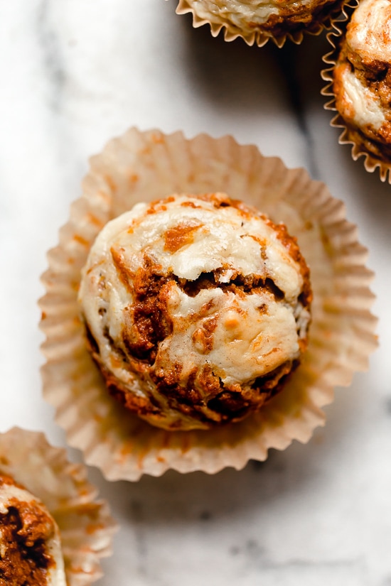 Pumpkin Cream Cheese Muffins are moist, delicious and perfectly spiced! A delicious fall breakfast treat made with canned pumpkin, pumpkin spice and a cream cheese swirl topping.