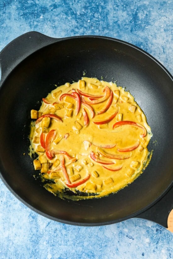 add bell peppers to coconut milk